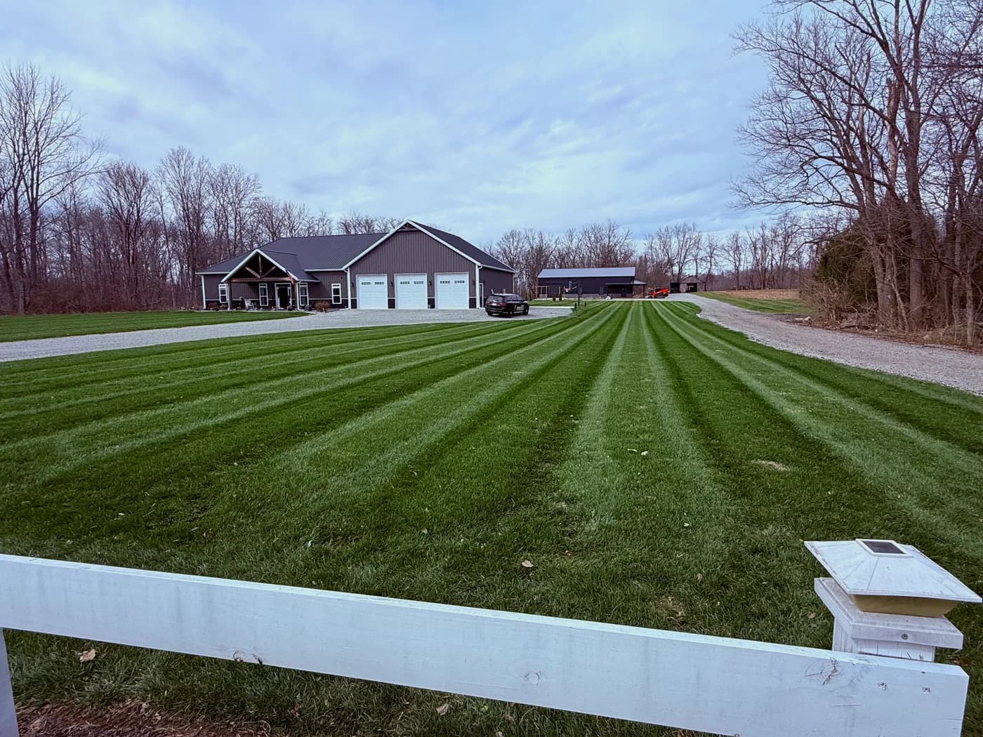 Wide mowed lawn in a residential neighborhood